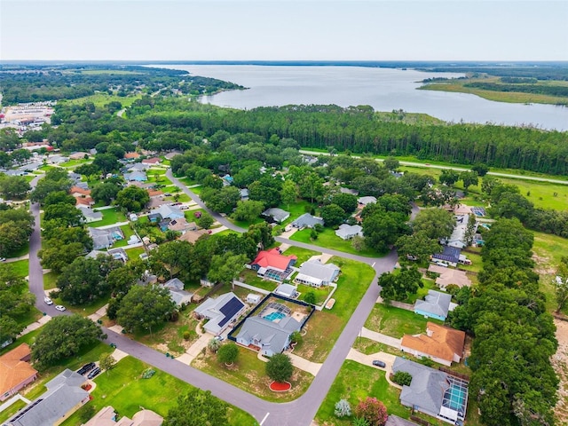 2705 Bayview Dr, Eustis, FL 32726 - aerial perspective of suburban area featuring a large body of water and a forest