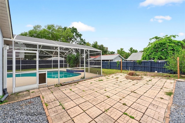 2705 Bayview Dr, Eustis, FL 32726 - view of pool featuring a patio, a fenced backyard, and glass enclosure