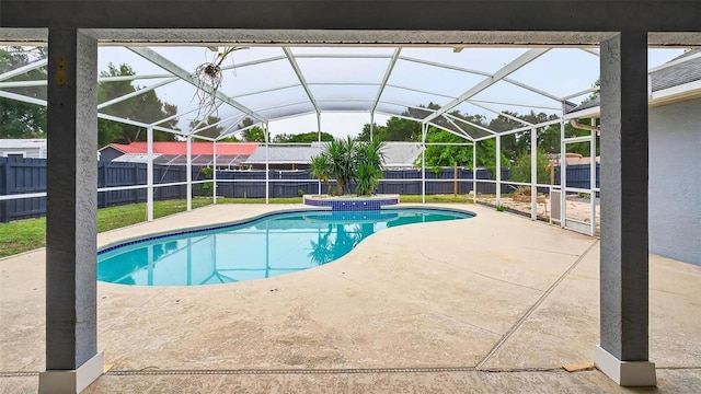2705 Bayview Dr, Eustis, FL 32726 - view of swimming pool featuring a fenced backyard, a patio, and glass enclosure