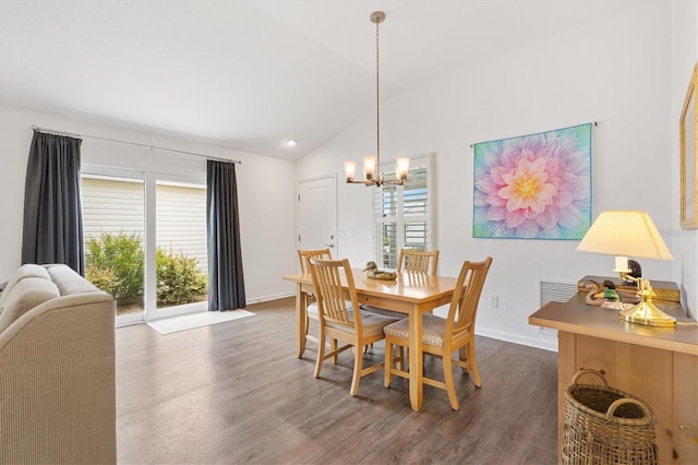 1225 Eunice St, The Villages, FL 34762 - dining space featuring a chandelier, healthy amount of natural light, dark wood-style flooring, lofted ceiling, and baseboards
