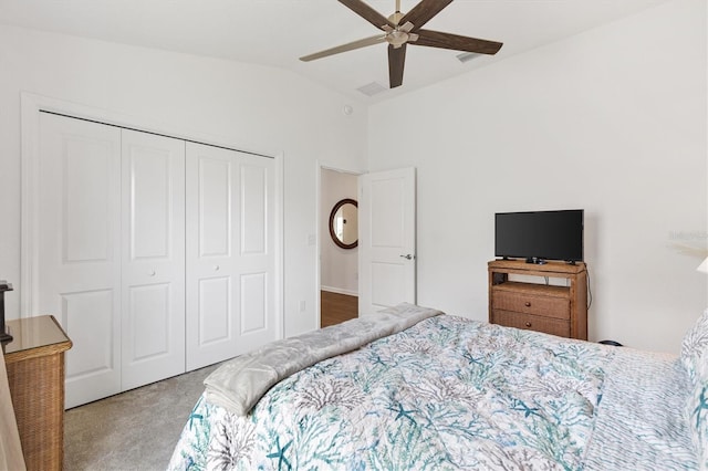 1225 Eunice St, The Villages, FL 34762 - carpeted bedroom with lofted ceiling, a closet, and a ceiling fan