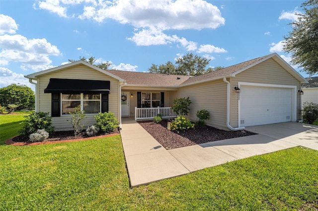 8537 SE 177th Bartram Loop, The Villages, FL 32162 - ranch-style home featuring a garage, a porch, a front yard, and driveway