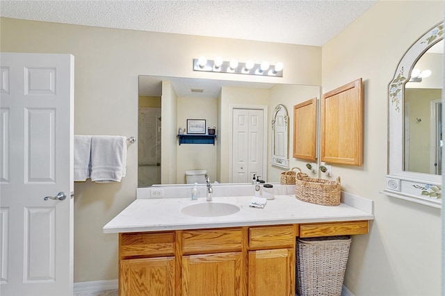 8537 SE 177th Bartram Loop, The Villages, FL 32162 - full bathroom featuring vanity, a shower, baseboards, and toilet
