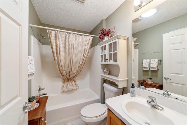 8537 SE 177th Bartram Loop, The Villages, FL 32162 - bathroom featuring shower / bath combo, a textured ceiling, vanity, and toilet