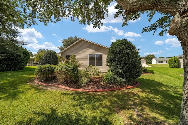 8537 SE 177th Bartram Loop, The Villages, FL 32162 - view of side of home featuring a yard