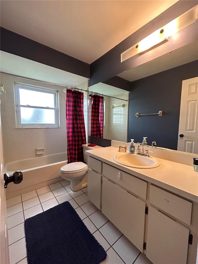 9375 Woodbreeze Blvd, Windermere, FL 34786 - bathroom featuring tile patterned floors, toilet, vanity, and shower / bath combo with shower curtain
