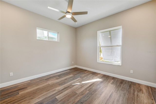 1042 Sugarloaf Key Loop, Lady Lake, FL 32159 - spare room featuring wood finished floors and ceiling fan