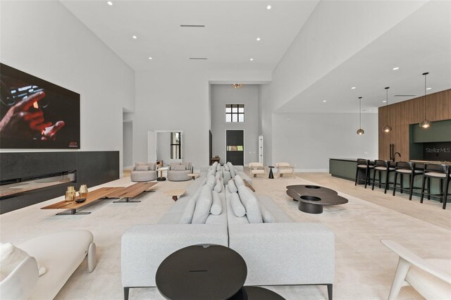 16320 Pendio Dr, Bella Collina, FL 34756 - living area with a towering ceiling and recessed lighting