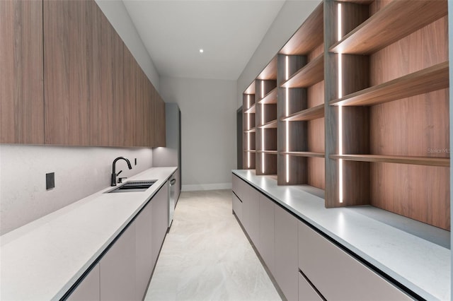 16320 Pendio Dr, Bella Collina, FL 34756 - washroom with a sink and baseboards