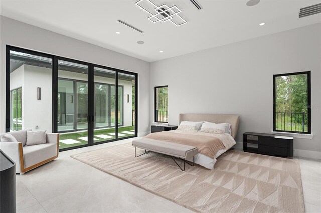 16320 Pendio Dr, Bella Collina, FL 34756 - tiled bedroom with access to exterior and recessed lighting