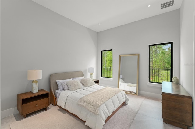 16320 Pendio Dr, Bella Collina, FL 34756 - bedroom with baseboards, recessed lighting, and light carpet