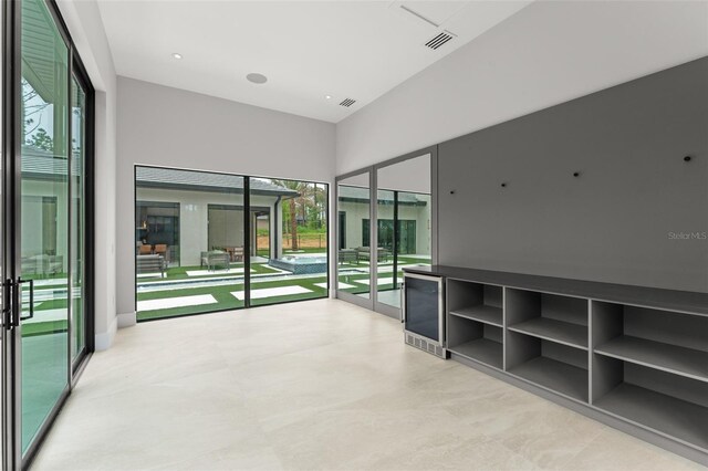 16320 Pendio Dr, Bella Collina, FL 34756 - unfurnished room featuring wine cooler