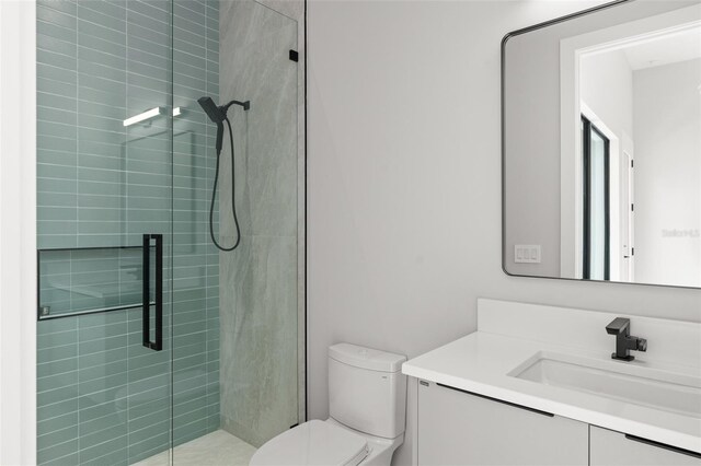 16320 Pendio Dr, Bella Collina, FL 34756 - full bathroom with vanity, toilet, and a stall shower