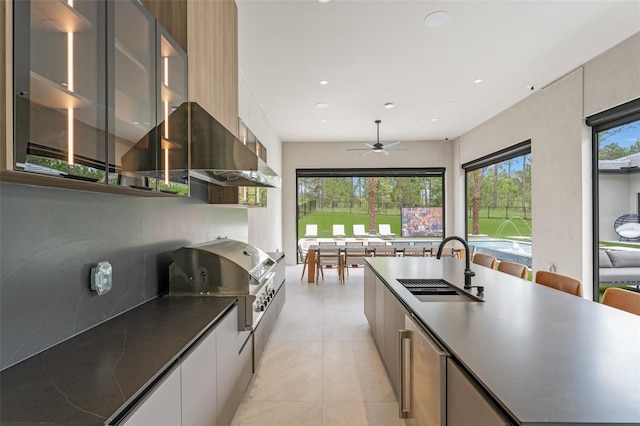 16320 Pendio Dr, Bella Collina, FL 34756 - kitchen featuring modern cabinets, a sink, plenty of natural light, and recessed lighting