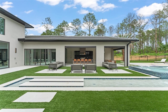 16320 Pendio Dr, Bella Collina, FL 34756 - back of house featuring an outdoor hangout area, stucco siding, and a patio