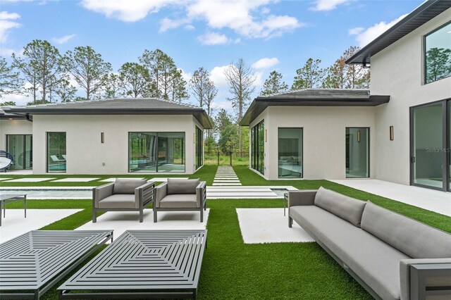 16320 Pendio Dr, Bella Collina, FL 34756 - view of patio with an outdoor living space