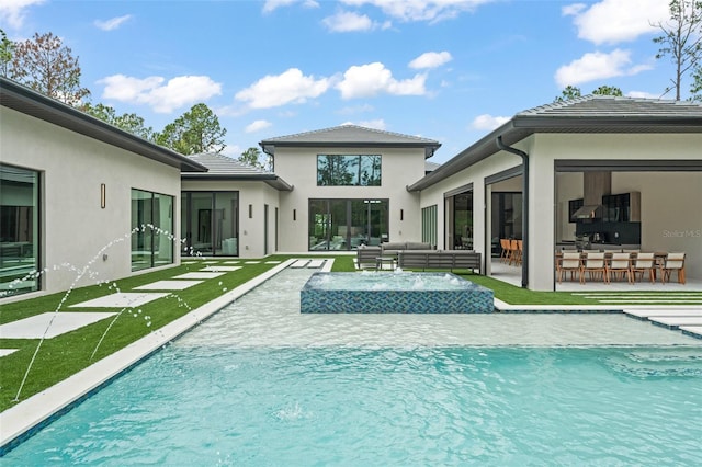 16320 Pendio Dr, Bella Collina, FL 34756 - view of pool with outdoor lounge area, a pool with connected hot tub, and a patio area