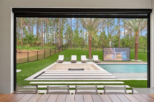 16320 Pendio Dr, Bella Collina, FL 34756 - view of swimming pool featuring view of wooded area