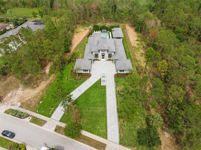 16320 Pendio Dr, Bella Collina, FL 34756 - view of subject property with a heavily wooded area