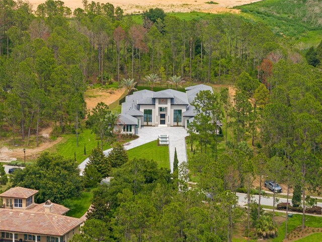 16320 Pendio Dr, Bella Collina, FL 34756 - view from above of property with a forest