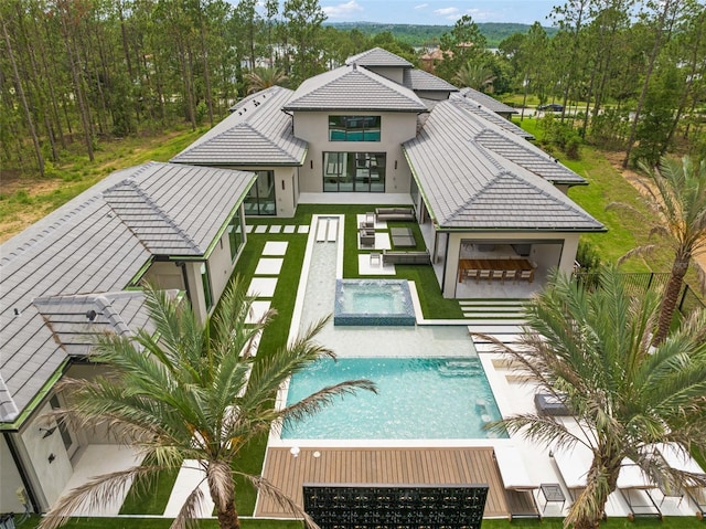 16320 Pendio Dr, Bella Collina, FL 34756 - view of pool with a pool with connected hot tub, an outdoor hangout area, and a patio