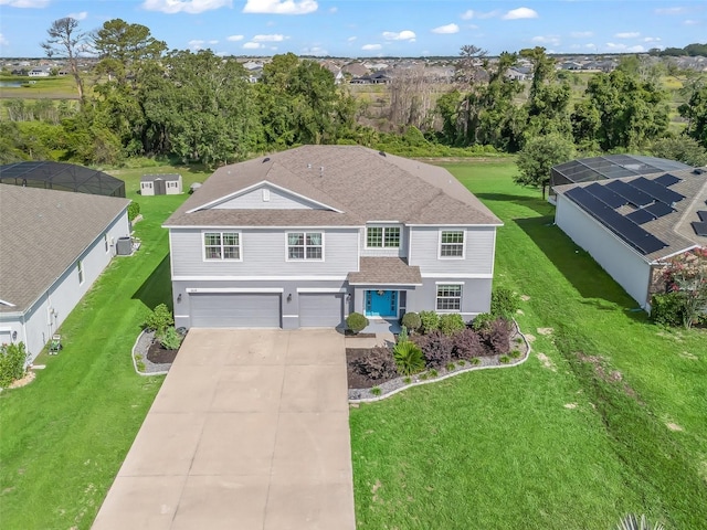 1824 Forest Glen Dr, Fruitland Park, FL 34731 - view of front of house featuring a garage, driveway, a shingled roof, a front lawn, and central air condition unit