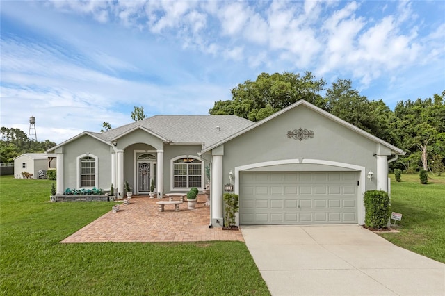 316 Dupont Cir, Howey In The Hills, FL 34737 - ranch-style house with a garage, stucco siding, concrete driveway, and a front yard