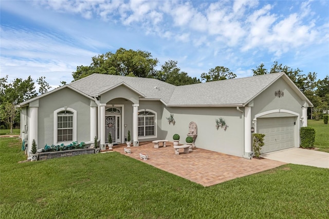 316 Dupont Cir, Howey In The Hills, FL 34737 - single story home with concrete driveway, a front yard, an attached garage, and stucco siding