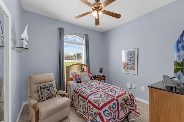 316 Dupont Cir, Howey In The Hills, FL 34737 - bedroom featuring carpet, baseboards, and a ceiling fan
