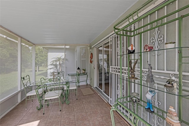 316 Dupont Cir, Howey In The Hills, FL 34737 - sunroom / solarium featuring tile patterned floors