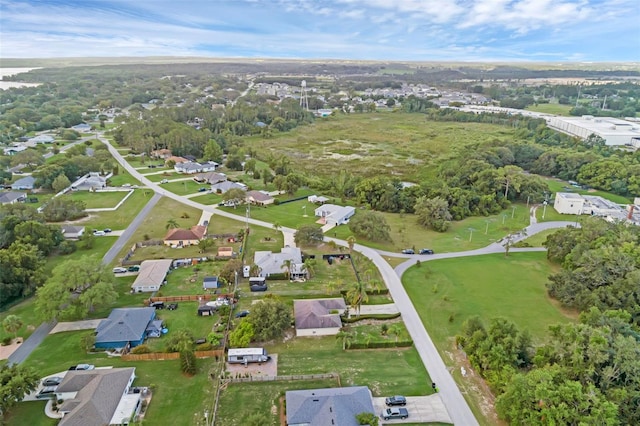 316 Dupont Cir, Howey In The Hills, FL 34737 - aerial view of property and surrounding area featuring nearby suburban area