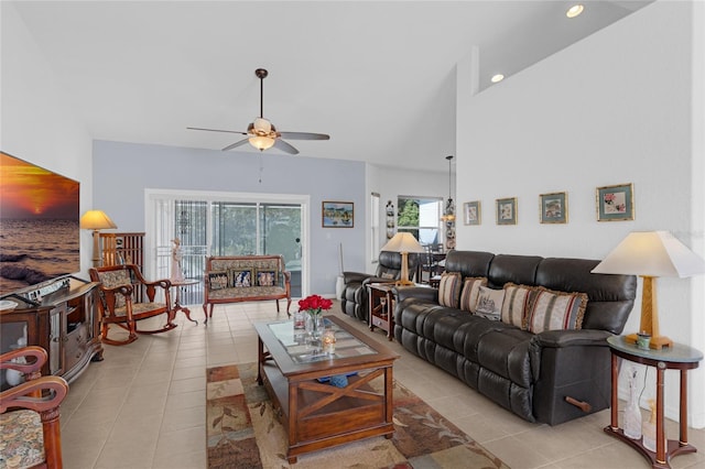 316 Dupont Cir, Howey In The Hills, FL 34737 - living room with a ceiling fan, tile patterned flooring, lofted ceiling, and recessed lighting