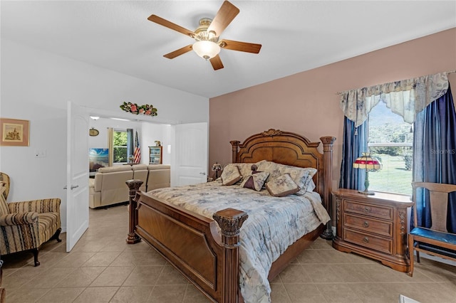 316 Dupont Cir, Howey In The Hills, FL 34737 - bedroom with light tile patterned flooring and ceiling fan