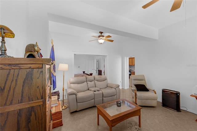 316 Dupont Cir, Howey In The Hills, FL 34737 - living area with ceiling fan, light tile patterned flooring, and lofted ceiling