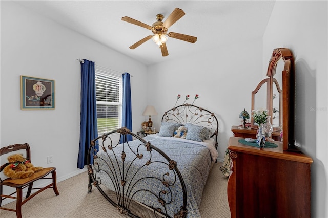 316 Dupont Cir, Howey In The Hills, FL 34737 - carpeted bedroom with baseboards and a ceiling fan