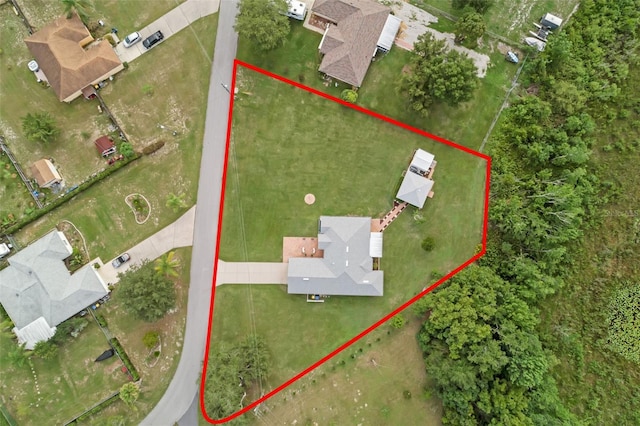 316 Dupont Cir, Howey In The Hills, FL 34737 - aerial view of property and surrounding area featuring property boundaries highlighted