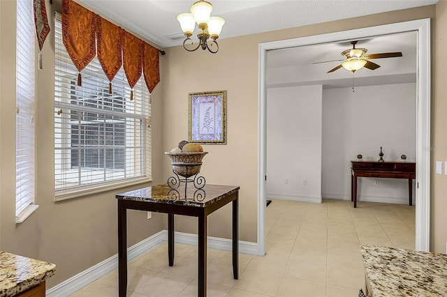 52 Camino Real Blvd, Howey In The Hills, FL 34737 - hall with a chandelier, baseboards, and light tile patterned floors