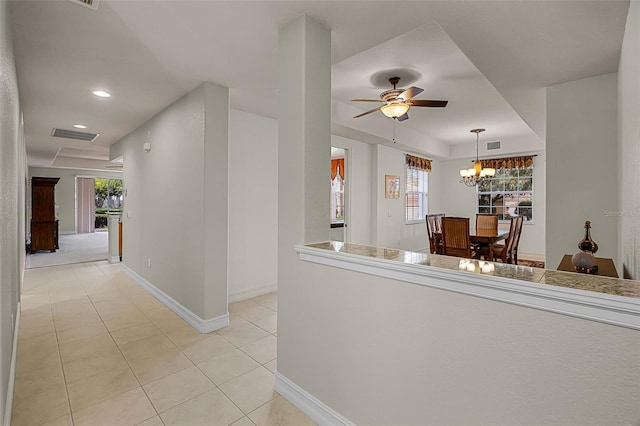 52 Camino Real Blvd, Howey In The Hills, FL 34737 - kitchen with light tile patterned floors, plenty of natural light, baseboards, a chandelier, and recessed lighting