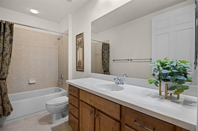 52 Camino Real Blvd, Howey In The Hills, FL 34737 - bathroom with vanity, shower / bath combo, tile patterned flooring, and toilet