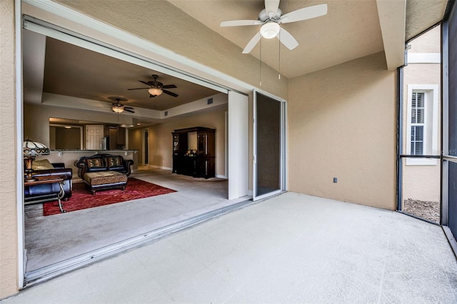 52 Camino Real Blvd, Howey In The Hills, FL 34737 - view of patio featuring a ceiling fan