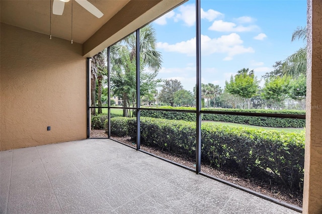 52 Camino Real Blvd, Howey In The Hills, FL 34737 - unfurnished sunroom with a ceiling fan