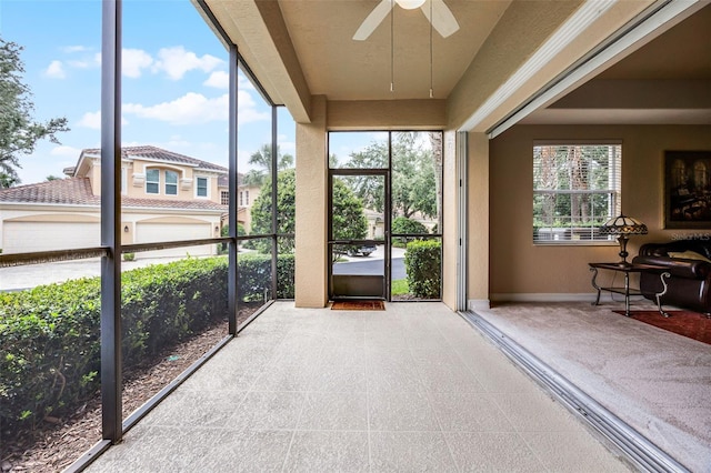 52 Camino Real Blvd, Howey In The Hills, FL 34737 - sunroom / solarium featuring ceiling fan and healthy amount of natural light