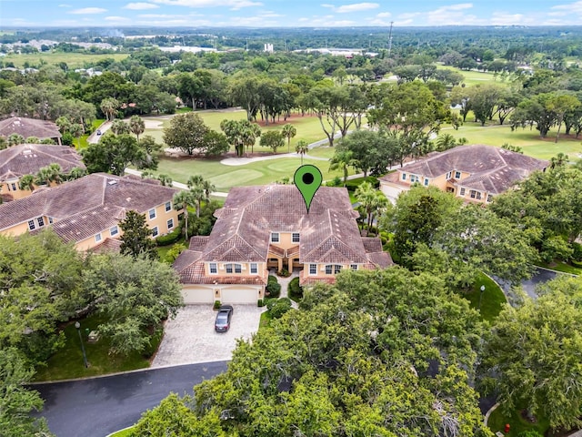 52 Camino Real Blvd, Howey In The Hills, FL 34737 - aerial view of a local golf course and a tree filled landscape