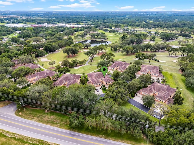 52 Camino Real Blvd, Howey In The Hills, FL 34737 - drone / aerial view of a golf club and a large body of water