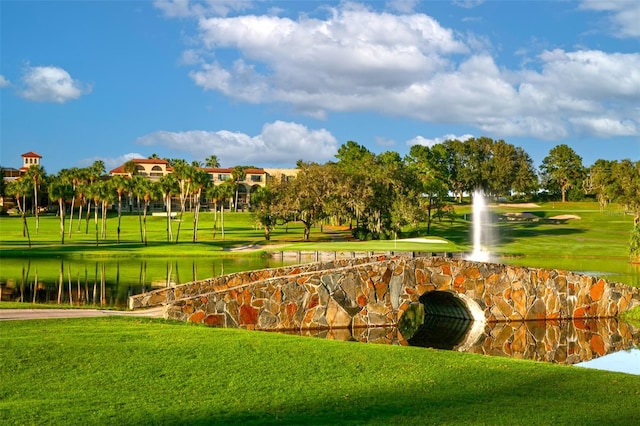 52 Camino Real Blvd, Howey In The Hills, FL 34737 - surrounding community with a yard and view of golf course