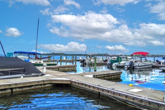 52 Camino Real Blvd, Howey In The Hills, FL 34737 - dock area featuring a water view