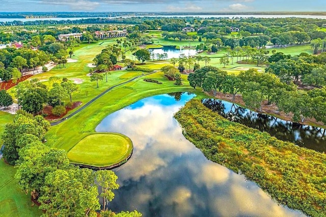 52 Camino Real Blvd, Howey In The Hills, FL 34737 - aerial overview of property's location with a large body of water, a golf club, and a tree filled landscape