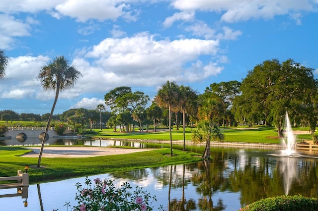 52 Camino Real Blvd, Howey In The Hills, FL 34737 - view of community with a water view, a lawn, and view of golf course
