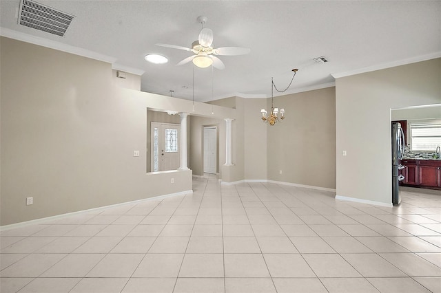 2104 Gerardo Ave, The Villages, FL 32159 - unfurnished room with ceiling fan, crown molding, plenty of natural light, baseboards, and a chandelier