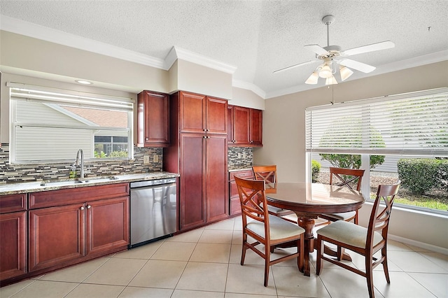 2104 Gerardo Ave, The Villages, FL 32159 - kitchen featuring stainless steel dishwasher, a sink, reddish brown cabinets, decorative backsplash, and a textured ceiling